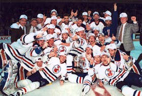 Members of the Cape Breton Oilers celebrate after winning the 1993 Calder Cup, defeating the Rochester Americans 7-2 at Centre 200 in Sydney on May 30, 1993. It's the lone American Hockey League championship ever won by a Cape Breton-based team. CAPE BRETON POST FILE