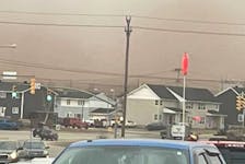 This hazy sky in Labrador West is caused by dust from area mines. -Contributed