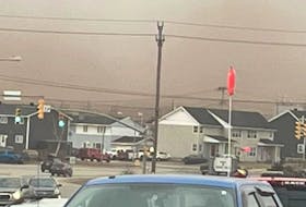 This hazy sky in Labrador West is caused by dust from area mines. -Contributed