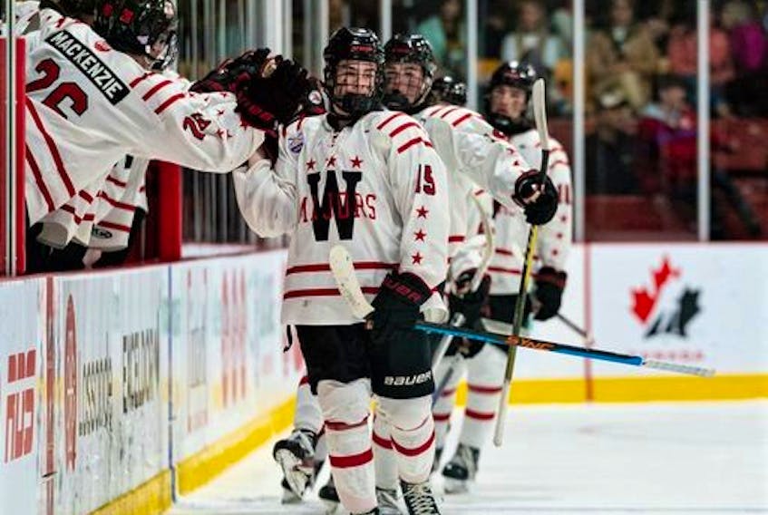 Led by Cade Moser (#15) of Linacy, the Weeks celebrate a goal at the nationals.