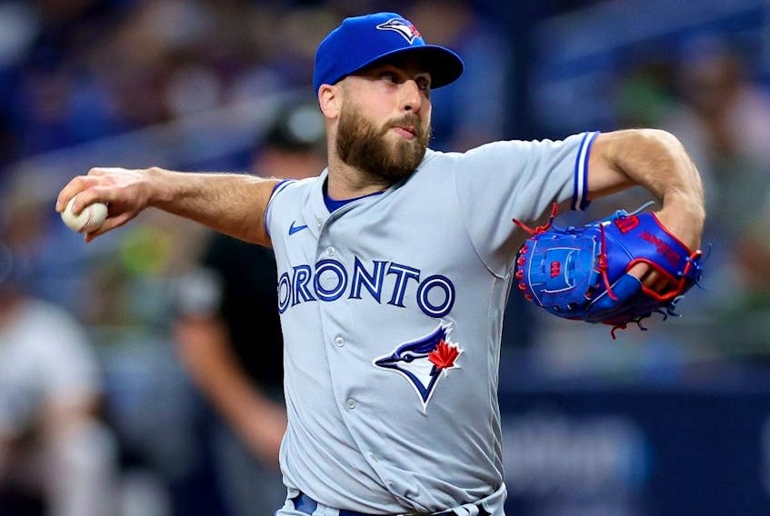 Anthony Bass of the Toronto Blue Jays pitches against the Tampa Bay Rays.