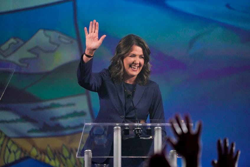 UPC Leader Danielle Smith waves to a crowd of supporters during her party's Alberta election night party after a projected win in Calgary on Monday night, May 29, 2023. - Todd Korol / Reuters