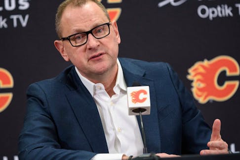 Ex-Calgary Flames general manager Brad Treliving speaks with the media.