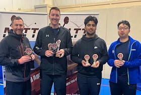 Jeff Clow (men’s doubles, team event champ), left, Todd Gregory (men’s singles, doubles, team event champ), Zaeem Arif (U21 singles champ) and Minh Nguyen (men’s team event champ) display their awards from the Atlantic Table Tennis Championships, which were held recently in St. John’s. CONTRIBUTED