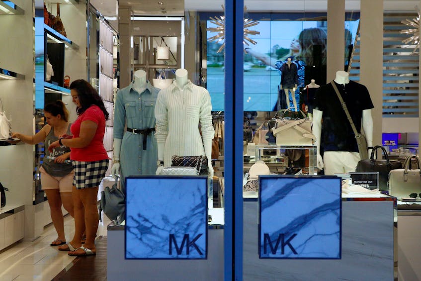 Michael Kors owner Capri cuts forecasts as demand slows, shares