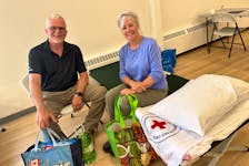 Alison Gledhill and John Grime, evacuees from the Shelburne County wildfire, were very grateful to have landed at a comfort centre in Yarmouth on May 31. TINA COMEAU
