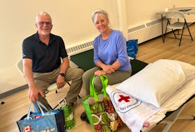 Alison Gledhill and John Grime, evacuees from the Shelburne County wildfire, were very grateful to have landed at a comfort centre in Yarmouth on May 31. TINA COMEAU