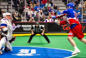 Mitch de Snoo of the Toronto Rock fires a shot on Halifax Thunderbirds goalie Warren Hill during a National Lacrosse League elimination game Friday night in Hamilton, Ont. Toronto won the game 15-11 to eliminate the Thunderbirds from post-season play. - NATIONAL LACROSSE LEAGUE