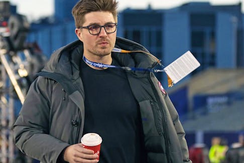 Kyle Dubas of the Toronto Maple Leafs heads to practice in 2022.