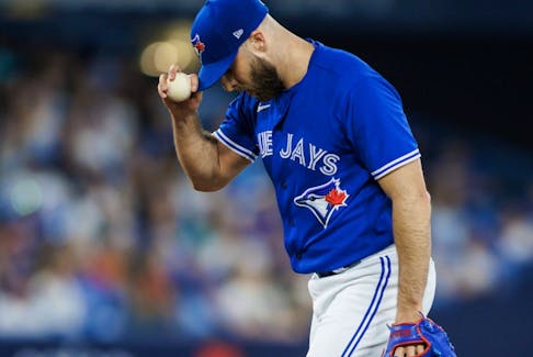Anthony Bass of the Toronto Blue Jays pitches in the ninth inning of their game against the Milwaukee Brewers at Rogers Centre on May 31, 2023 in Toronto.