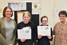 Olivia Conrad and Mason Smith were Grade 6 students at Thorburn Consolidated last year when they were chosen as recipients of Shannon’s Sneakers. With them are Shannon Fraser’s sister, Kim Webster, and her mother Brenda Fraser. Contributed
