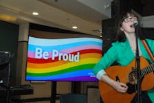 Singer/songwriter Evelyn Jess of Ragged Harbour performs Thursday in the Confederation Building’s main lobby during an event to begin the summer 2023 Pride season in the province. JOE GIBBONS • THE TELEGRAM