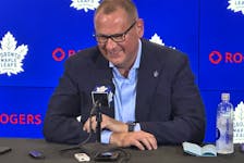 Brad Treliving shares a laugh with the media on hand yesterday during his first news conference as the new general manager of the team in Toronto on Thursday June 1, 2023.
