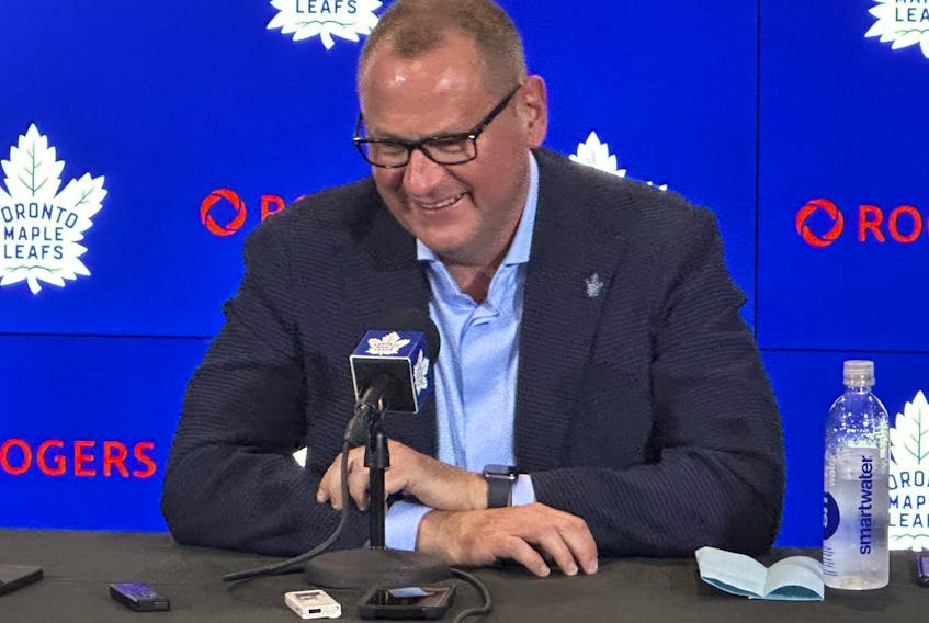 Brad Treliving shares a laugh with the media on hand yesterday during his first news conference as the new general manager of the team in Toronto on Thursday June 1, 2023.