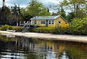 The historic yellow camp owned by the Scott family of Barrington, was a survivor in the Barrington Lake fire. Built just after World War II ended, the camp was the first recreational camp built on the Barrington Lake shoreline. CONTRIBUTED