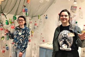 Abi Coleman, a St. Mary’s University student, and Bailey Chase, a Mount Saint Vincent student, provide information on a plastics and pollution exhibit at Northumberland Fisheries Museum. Coleman is in her fourth year of employment with the museum while Chase is in her first.