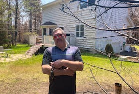 Ed Duval stands in front of his Hammonds Plains home. He says the wildfires caused at least $40,000 in damage to his property.