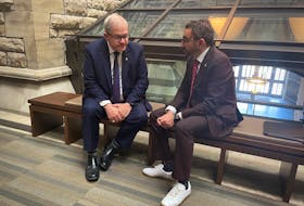 Cardigan MP Lawrence MacAulay, left, speaks to federal Transport Minister Omar Alghabra in Ottawa on June 19 about the situation with P.E.I.’s ferry system. The MV Confederation needs a part that has to be manufactured and will be out of service for the next three weeks. Contributed