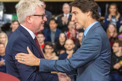 Frank Blome, the CEO of PowerCo., VW’s battery-making subsidiary, greets Prime Minister Justin Trudeau Friday, April 21, during the official announcement of the company's new St. Thomas plant.
