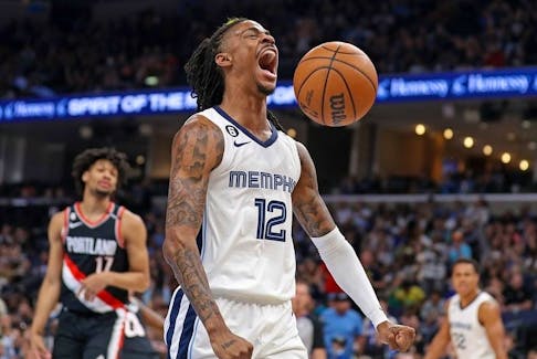 Ja Morant of the Memphis Grizzlies reacts during the first half against the Portland Trail Blazers at FedExForum on April 04, 2023 in Memphis, Tennessee. 