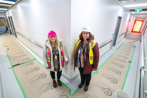 (Left to right) Dr. Christine Short, senior medical director of redevelopment for Nova Scotia Health’s central zone, and Cynthia Stockman, site lead, pose for a picture during a tour of the unfinished QEII Community Outpatient Centre in Bayers Lake this February. PHOTO CREDIT: Communications Nova Scotia