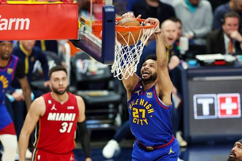 Jamal Murray of the Denver Nuggets dunks during the first quarter against the Miami Heat in Game 1 of the 2023 NBA Finals at Ball Arena on June 1, 2023 in Denver.