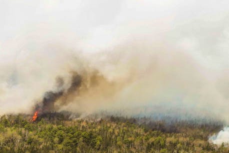 Wildfires spread in eastern Canada, forcing evacuations in coastal Quebec