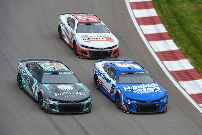 NASCAR Cup Series driver Carson Hocevar (7) trails Kyle Larson (5) and Noah Gragson (42) during the Enjoy Illinois 300 erlier this month at World Wide Technology Raceway in Madison, Ill. - Joe Puetz / USA Today Sports