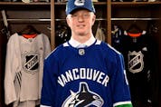  Jack Rathbone, 95th overall pick of the Vancouver Canucks, poses for a portrait during the 2017 NHL Draft at the United Center on June 24, 2017 in Chicago, Illinois.