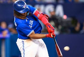 Vladimir Guerrero Jr. of the Blue Jays hits a two-run home run in the sixth inning against the Athletics at Rogers Centre in Toronto, Saturday, June 24, 2023.