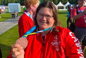 Alyssa Chapman proudly displays the bronze medal the Murray Harbour resident won as a member of Team Canada’s female soccer team at the Special Olympics World Games in Berlin, Germany, on June 23. Special Olympics P.E.I. • Special to The Guardian