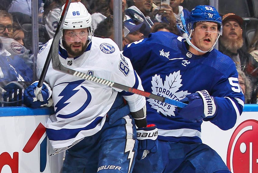 Maple Leafs’ Noel Acciari (right), here getting physical with Tampa Bay’s Nikita Kucherov, is the kind of rugged winger that new GM Brad Treliving favours. Only problem is that Acciari is a free agent and will have to be re-signed by Treliving, if he is to return to the Leafs next season. 