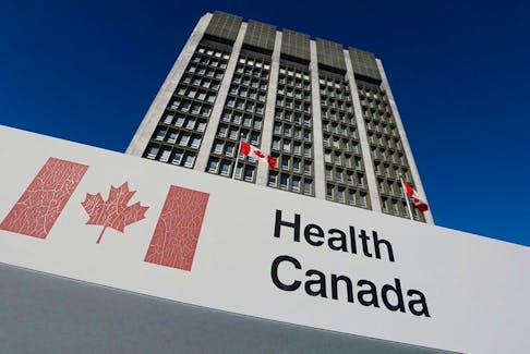 A sign is displayed in front of Health Canada headquarters in Ottawa. 