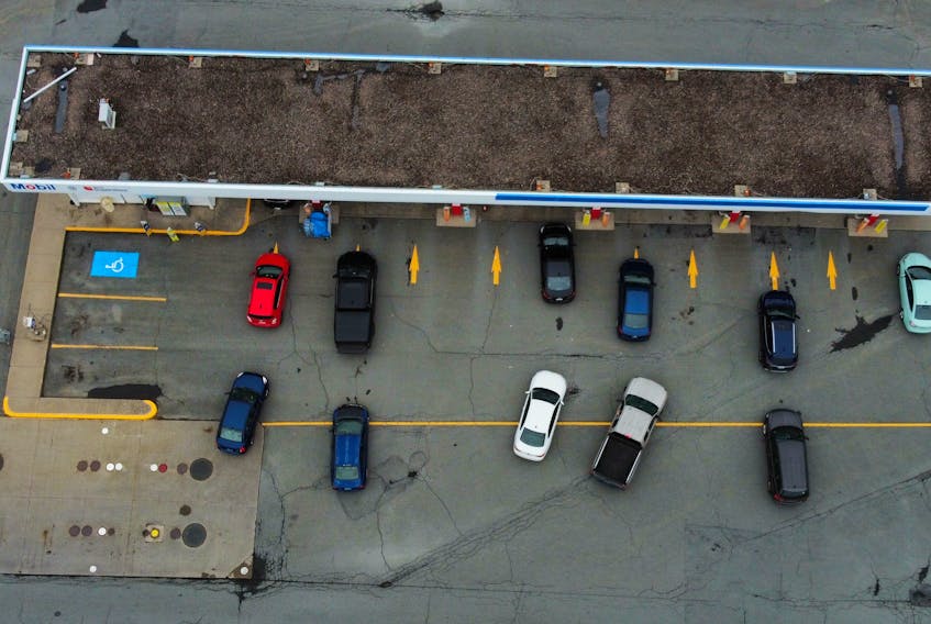 Car queue for fuel at a Joe Howe service station, on the eve of the implementation of the federal carbon tax, in Halifax Friday June 30, 2023

Tim Krochak photo