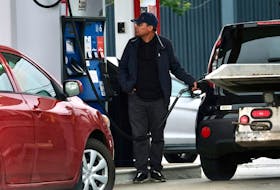 Car owners get gas ahead of the implementation of the carbon tax, at a service station in Halifax Friday June 30, 2023