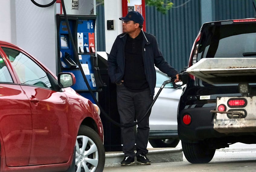 Car owners get gas ahead of the implementation of the carbon tax, at a service station in Halifax Friday June 30, 2023