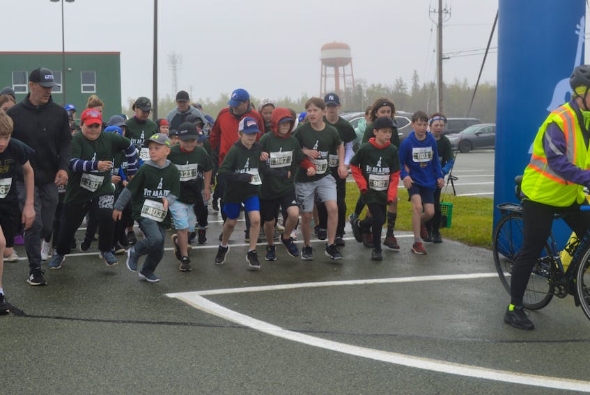 Despite the wet and colder, the Doctors Nova Scotia Youth Run on the Cape Breton University campus on Sunday as a huge success that saw nearly 1,000 runners register and their parents and other supporters line the route. BARB SWEET/CAPE BRETON POST