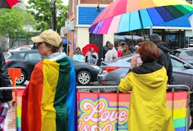 Supporters of the Drag me to Family Dinner drag show stood outside the King’s Arms Pub in Kentville on June 3 while people protested across the street.