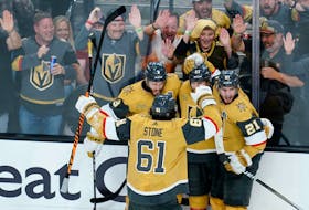 Jun 3, 2023; Las Vegas, Nevada, USA; Vegas Golden Knights defenseman Shea Theodore (27) celebrates with teammates after scoring a goal against the Florida Panthers during the second period in game one of the 2023 Stanley Cup Final at T-Mobile Arena. Mandatory Credit: Lucas Peltier-USA TODAY Sports  Vegas Golden Knights' Shea Theodore (27) celebrates with teammates after scoring a goal against the Florida Panthers  in Game 1 of the 2023 Stanley Cup Final in Las Vegas on Saturday night. Lucas Peltier-USA TODAY Sports