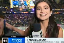 Miami TV reporter Samantha Rivera fends off an unruly fan in Las Vegas on Monday night.