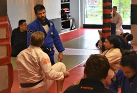 Truro native and accomplished Brazilian Jiu-Jitsu athlete Jake MacKenzie providing instruction to those participating in a recent training session at the Truro BJJ club on Prince Street. MacKenzie and his wife Melissa Britez Costa recently opened their own gym in Halifax. Richard MacKenzie
