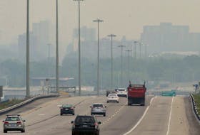 The hazy skyline over downtown Ottawa is seen from Highway 417 near Kanata on Monday, June 5, 2023.