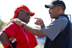 Former Toronto Blue Jays manager Cito Gaston (right) talks with Cincinnati Reds manager Dusty Baker.