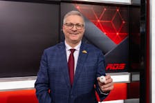 Ritchie Thibeau holds the lucky lottery ball after the Moncton Wildcats received the first overall pick in the 2023 Quebec Major Junior Hockey League Entry Draft. The Isle Madame, Richmond County, product is the Wildcats’ general manager.  CONTRIBUTED/VINCENT ETHIER, QMJHL