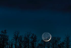 Earthshine, also known as Da Vinci's glow, is sunlight reflected off the sun-lit portion of Earth striking the unlit part of the moon. The phenomena will be visible, if skies are clear, on the waning crescent moon the mornings of June 13 and 14. Terry Richmond/Unsplash