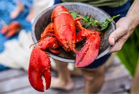Lobster Prince Edward Island will be partnering with over 50 locally owned businesses across P.E.I. as part of the new Legendary P.E.I. Lobster Crawl, showcasing lobster-themed restaurant dishes, retail shipment process, excursions and other events. Stock Image