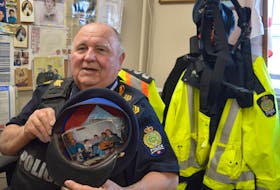 Cape Breton Reginal Police Sgt. Barry Gordon has kept his family close to him while on the job — a photo duct taped inside his his hat. BARB SWEET/CAPE BRETON POST