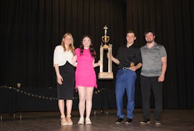 Jenny Chaisson, second left, and John Haley, second right, were recently named the 2022-23 senior athletes of the year at Souris Regional School. Chaisson and Haley receive congratulations from the 2021-22 athletes of the year, Brooke Robertson, left, and Connor McInnis. Contributed