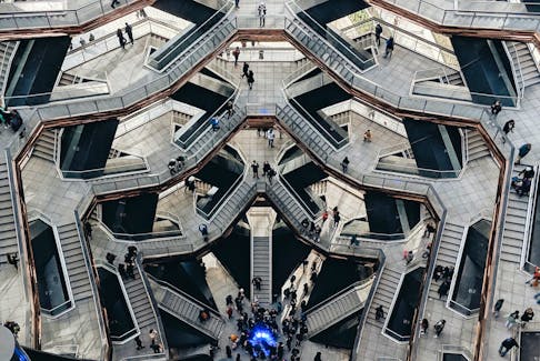 Trying to reach someone at a local bank branch can feel like being thrown into the middle of Dante’s Inferno or an Escher drawing. Juliana Malta/Unsplash