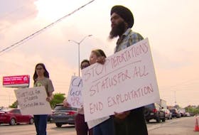 Balbir Singh of Surrey participated in a rally supporting international students affected by an investigation involving fraudulent admission letters to Canadian post-secondary schools.